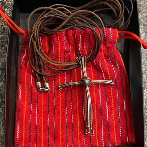 Sterling Silver 925- and genuine leather.